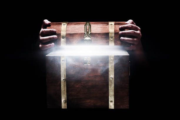 Wooden treasure chest on dark background