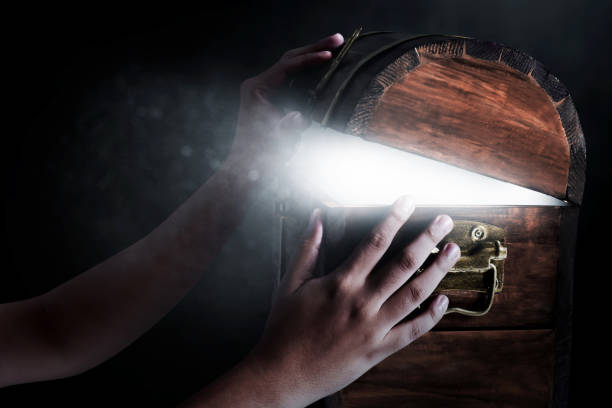 Wooden treasure chest on dark background