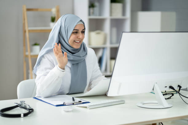 istock Medical Doctor Holding Online Elearning Video 1357626354