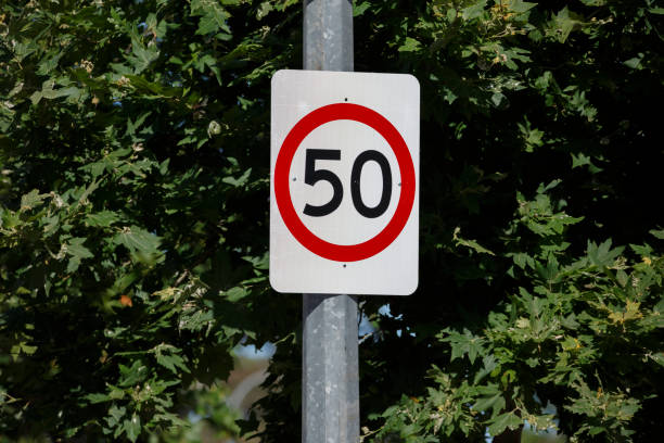 50 speed sign on the road 50 speed sign outdoors on a street in Adelaide, South Australia speed limit sign australia stock pictures, royalty-free photos & images