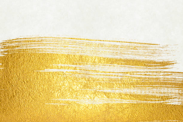 istock Background image of golden patterns on white Japanese paper 1357633095