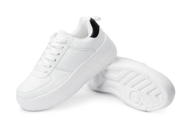 istock New pair of white sneakers isolated on white 1357633275