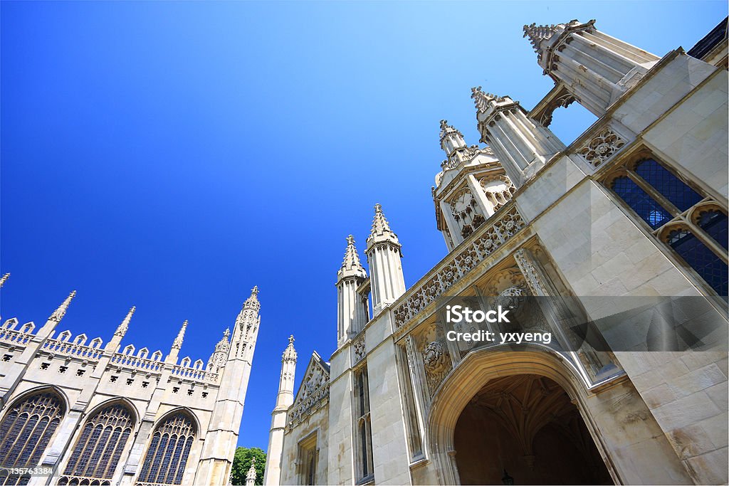 View of Kings College looking up towards the sky Shot capturing King's College's Chapel and Front Gate Cambridge - England Stock Photo