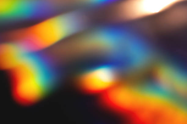 istock colorful rainbow crystal light leaks on black background 1357635848