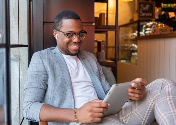 istock Male Freelancer At Coffee Shop 1357635900