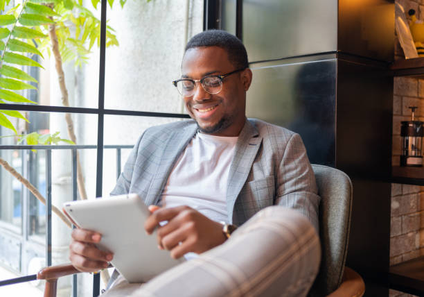 istock Male Freelancer At Coffee Shop 1357635903