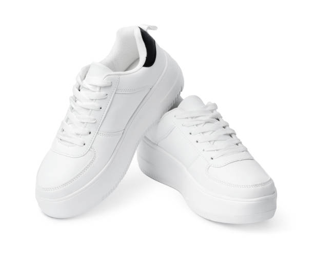 istock New pair of white sneakers isolated on white 1357635945