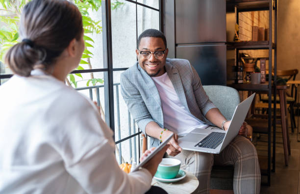 istock Business Meeting At Coffee Shop 1357636006
