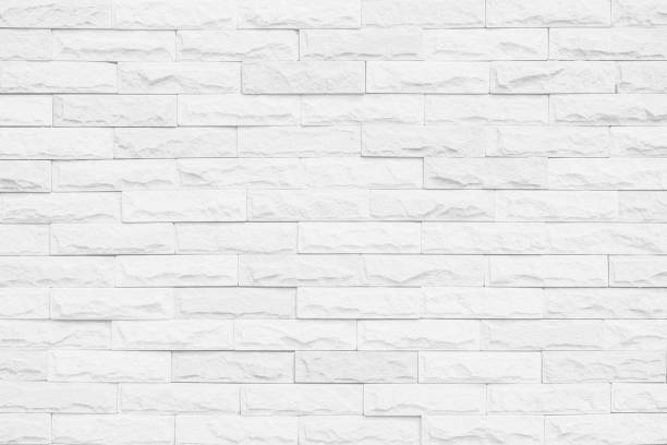 istock White grunge brick wall texture background for stone tile block painted in grey light color wallpaper modern interior and exterior and room backdrop design 1357638132