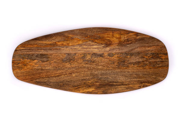 istock Wooden cutting board top view. Chopping board isolated on white background. 1357641587
