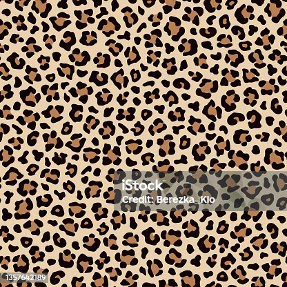 istock Leopard beige brown spotty fur seamless pattern. Vector 1357642189