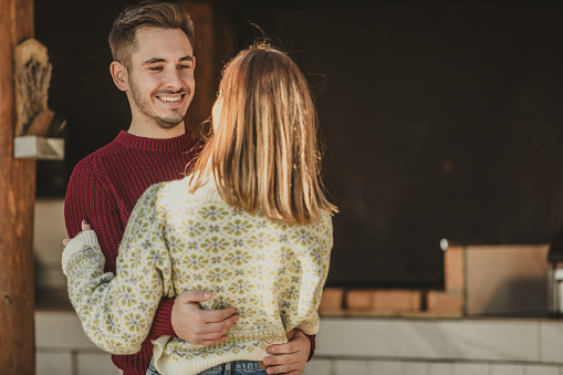 Couple Falling In Love While Dancing Around In Front Of A Rustic Cabin Stock Photo - Download ...