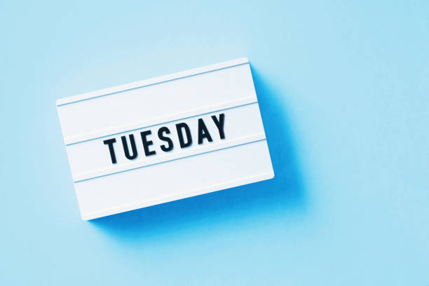 istock Tuesday Reads Over White Lightbox Sitting On Blue Background 1357644299