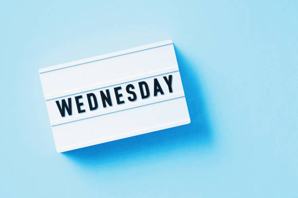 istock Wednesday Reads Over White Lightbox Sitting On Blue Background 1357644561