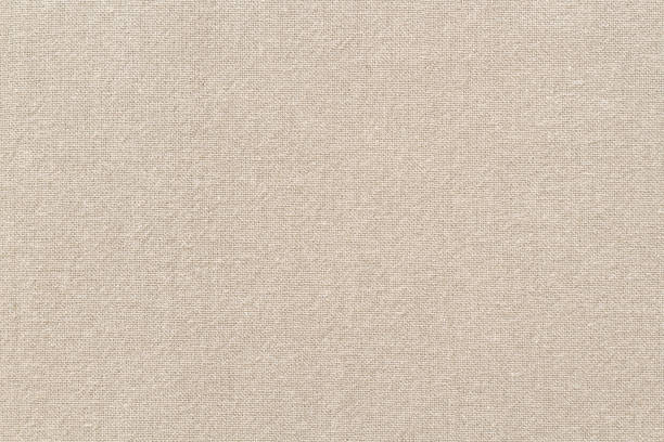 textura de tecido de algodão marrom para fundo, padrão têxtil natural. - embroidery canvas beige close up - fotografias e filmes do acervo