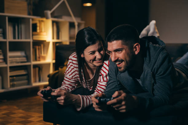 istock young couple relaxing at home . evening scene 1357647403