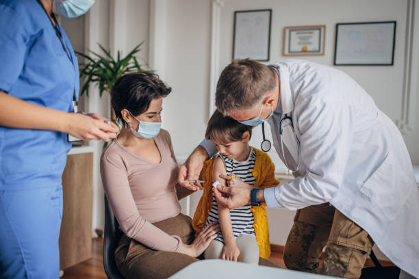 istock Little girl getting vaccinated 1357648458