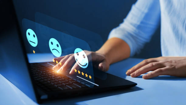 Woman who gives leave feedback on the bought product with gold five star rating feedback on virtual sreen. Customer review satisfaction feedback.Concept of satisfaction, quality and performance. Woman who gives leave feedback on the bought product with gold five star rating feedback on virtual sreen. Customer review satisfaction feedback.Concept of satisfaction, quality and performance customer feedback stock pictures, royalty-free photos & images
