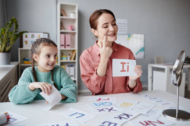 istock Teaching to read the letter in right way 1357653729