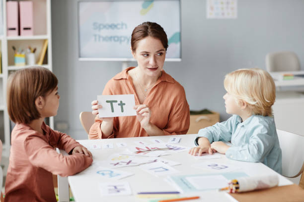istock English teacher with children at school 1357653743