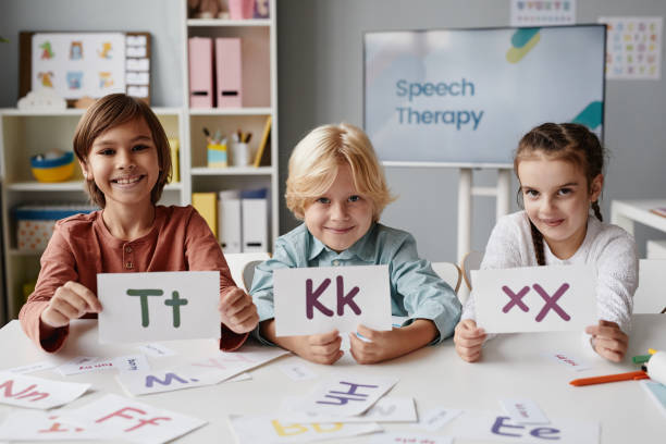 istock Children learning English at school 1357653759