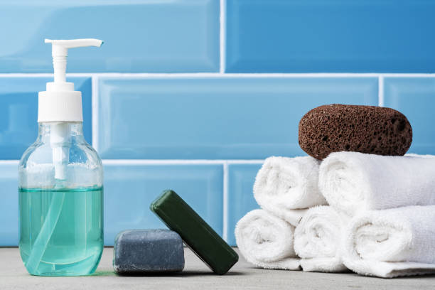 istock Soap and toiletries on shelf in blue bathroom 1357653997