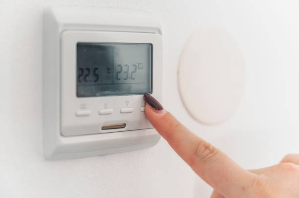 istock Young woman living in a smart home 1357657231