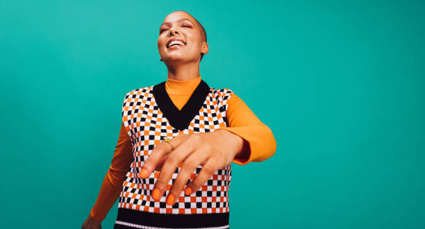 istock Young woman dancing in a studio 1357660057