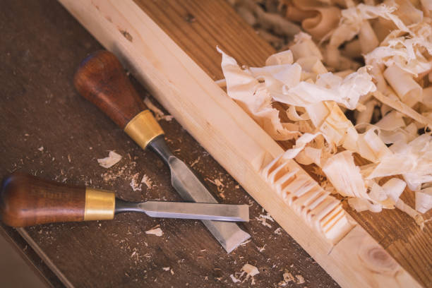 istock Carpenter working with equipment on wooden 1357660925
