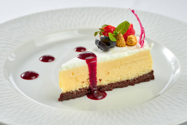 istock Cheesecake with sauce in a white plate on a white plate 1357662167