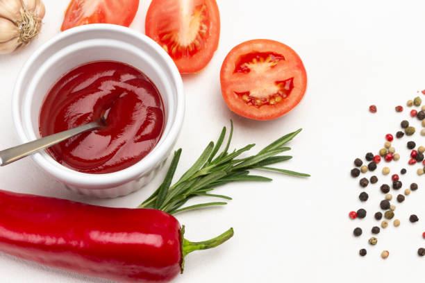 istock Raw pepper, allspice and rosemary on table. 1357662633