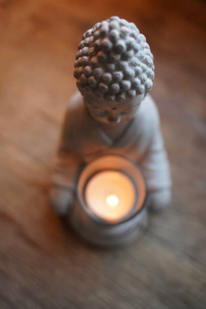 Buddha candle stock photo