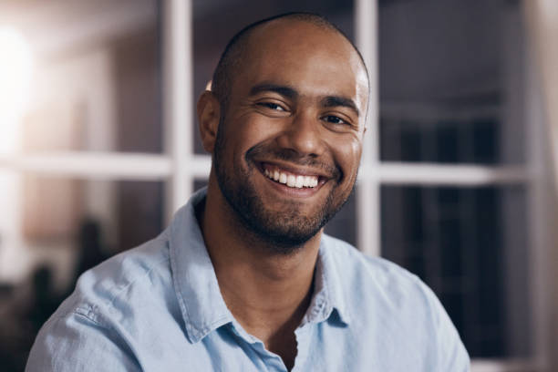 istock Shot of a young businessman taking a break from working at night 1357669663