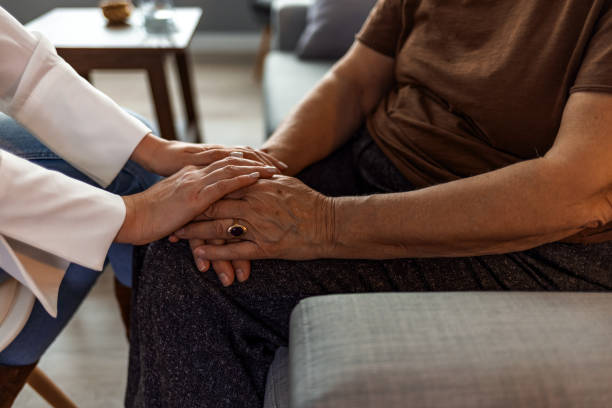 istock Mother and daughter holding hands. 1357670866