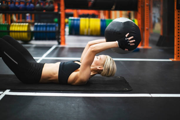 istock Woman training in gym 1357671007