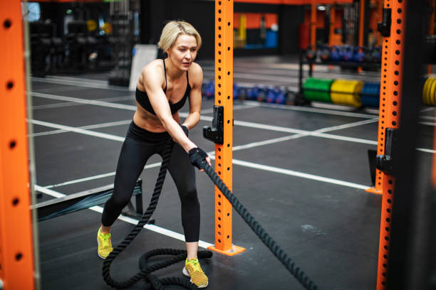 istock Woman training in gym 1357671066