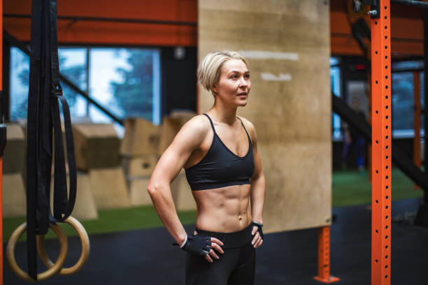 istock Woman training in gym 1357671298