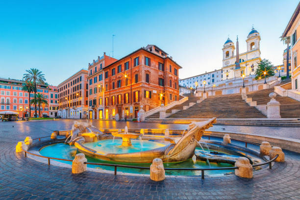 baraccia fountain and spanish steps in spanish square, rome, italy - rome italië stockfoto's en -beelden