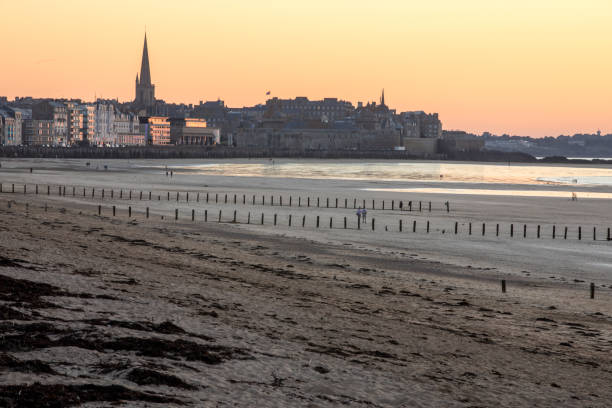 The evening light on beach and olt town of Saint Malo , France, Ille et Vilaine, Brittany, France, stock photo