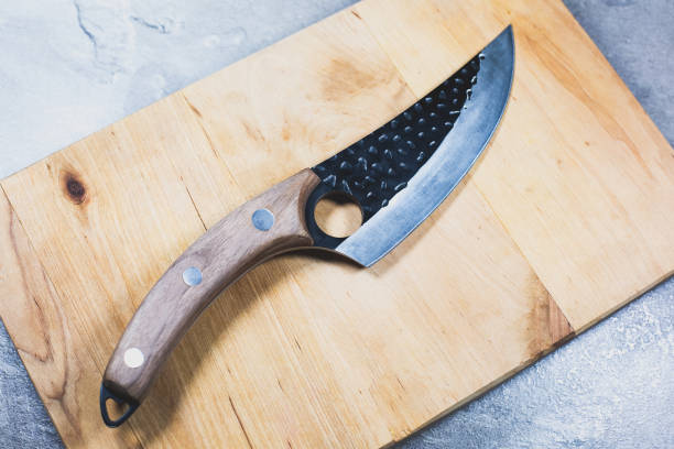 istock Big kitchen knife with wooden handle. 1357684929