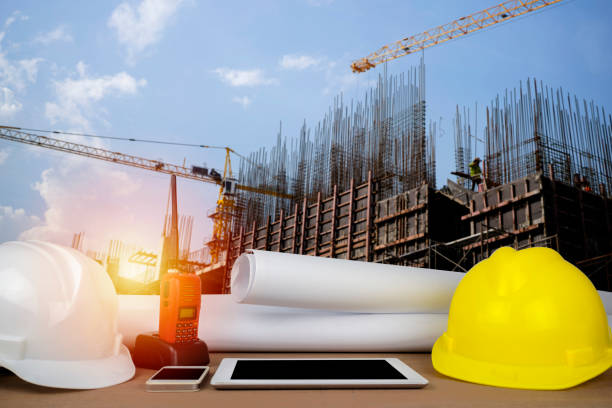 istock control concept. The construction of a large building, structure building with a crane 1357686289