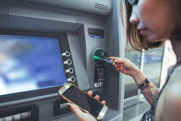 Withdraw or deposit from cash machine stock photo