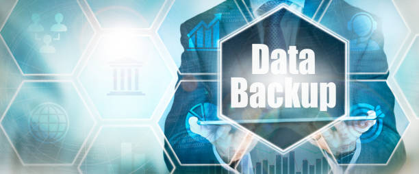 istock A Data Backup business concept on a futuristic blue display. 1357692126
