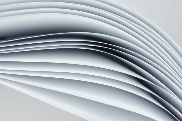 istock Abstract background, sheets of paper forming a pattern of curved lines. 1357692519