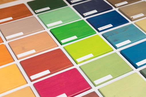 samples of paints for the care of wooden structures, a palette of materials for the protection of wood outdoors.