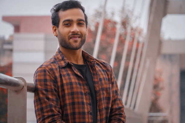 istock Indian man at college campus with a beautiful background 1357694684