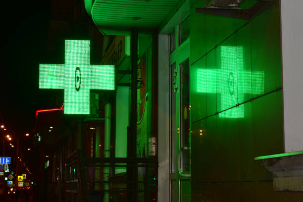 istock Reflection of a luminous cross on the wall. 1357694701