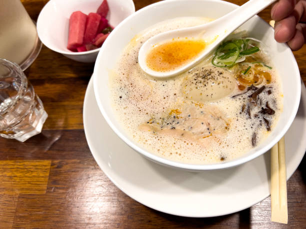 istock Ramen with white foamy broth in Japanese restaurant 1357694985