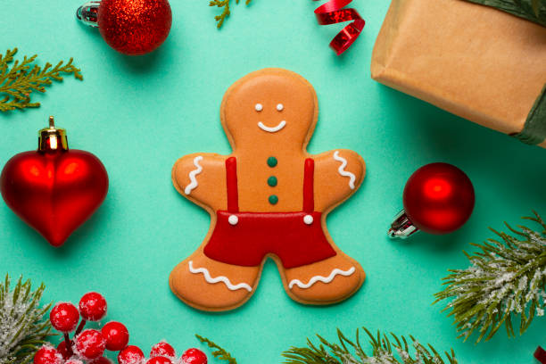 istock Christmas composition with decorations and ornaments on a mint background 1357697633