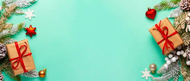 istock Christmas composition with decorations and ornaments on a mint background 1357697713